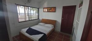 Cama o camas de una habitación en Hotel Mar del Viento