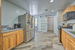 A kitchen or kitchenette at Stylish Basecamp 6850 - 2 Blocks to Downtown!