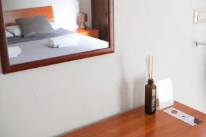 Postel nebo postele na pokoji v ubytování Largo Imperiali B&B