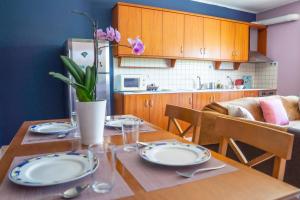 Kuchyňa alebo kuchynka v ubytovaní Secret Garden 76 sq.m. apartment close to city center