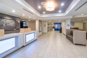a lobby of a hospital with a waiting room at Holiday Inn Express Hotel & Suites Bluffton at Hilton Head Area by IHG in Bluffton +45 photos