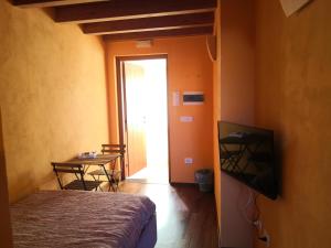A bed or beds in a room at San Berillo house