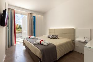 Afbeelding uit fotogalerij van Sirius Luxury Rooms in San Vito lo Capo