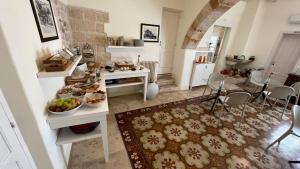 Cucina o angolo cottura di Antico Mondo Rooms & Suites