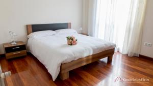 Posteľ alebo postele v izbe v ubytovaní Chalet vacacional Tina Menor - Casas de los Picos