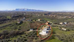 an aerial view of a house with a red circle at Villa Caravaggio Comfort e Relax in Rocca San Giovanni