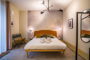 A bed or beds in a room at Cielo e Nuvole