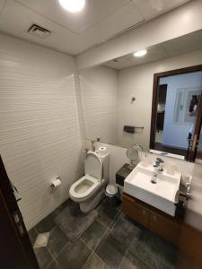 Fotografie z fotogalerie ubytování Cozy 1BR in Iconic Tower v destinaci Abu Dhabi