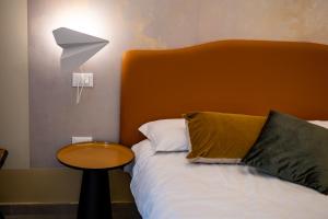 A bed or beds in a room at Cielo e Nuvole