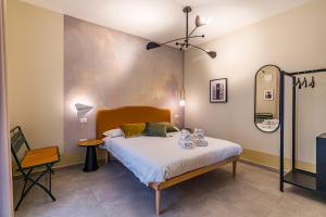 A bed or beds in a room at Cielo e Nuvole
