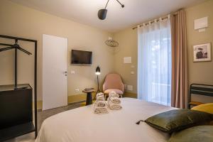 A bed or beds in a room at Cielo e Nuvole