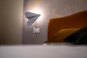 A bed or beds in a room at Cielo e Nuvole