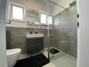 Koupelna v ubytování Apartman Dominic
