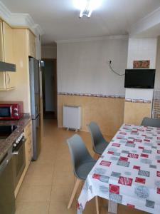 A kitchen or kitchenette at boiro playa barraña