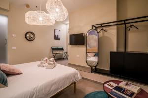 A bed or beds in a room at Cielo e Nuvole