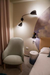 A bed or beds in a room at Cielo e Nuvole