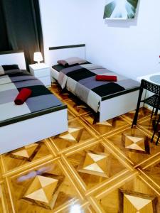 Posteľ alebo postele v izbe v ubytovaní zPula Center Studio Apartments
