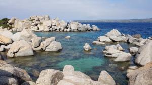 a large group of rocks in a body of water at RESIDENCE PUNTA SERENA in Bocca del Oro