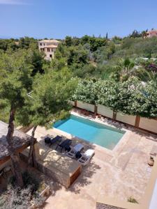 Bazén v ubytovaní PLEIADES lUXURY APARTMENTS alebo v jeho blízkosti