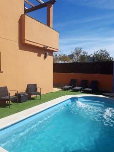 Kolam renang di atau di dekat Magnifico chalet con piscina privada
