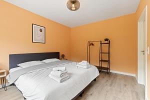 Postel nebo postele na pokoji v ubytování Haus Blaue Traube mit moselblick