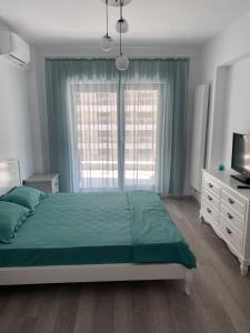 En eller flere senge i et værelse på Sophia Residence-Casa del Mar + 36 billeder