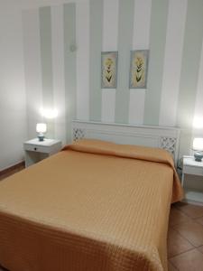 Postel nebo postele na pokoji v ubytování Appartamentino Cinisi
