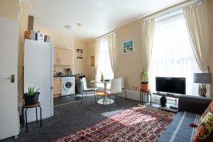 A television and/or entertainment centre at Margate two bedroom apartment