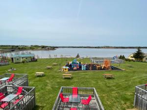 an aerial view of a park with a playground at Beach & Breeze Cottages in Stanley Bridge