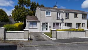 a house with a driveway in front of it at TravelMore in Letterkenny