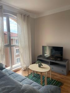 Et tv og/eller underholdning på Marea Garden apartments