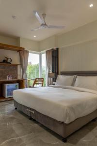 Postel nebo postele na pokoji v ubytování Hotel Nalanda + 37 fotografií