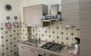 Kuchyň nebo kuchyňský kout v ubytování Maison Giulia