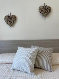 Postel nebo postele na pokoji v ubytování Maison Giulia