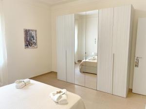 Postel nebo postele na pokoji v ubytování Maison Giulia