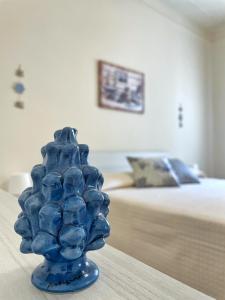 Postel nebo postele na pokoji v ubytování Maison Giulia
