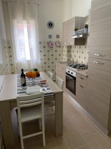 Kuchyňa alebo kuchynka v ubytovaní Maison Giulia + 29 fotografií