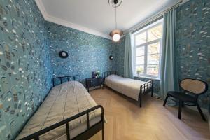 Postel nebo postele na pokoji v ubytování Lovely 2-bedroom apartment with free parking