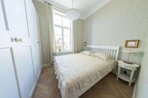 Postel nebo postele na pokoji v ubytování Lovely 2-bedroom apartment with free parking