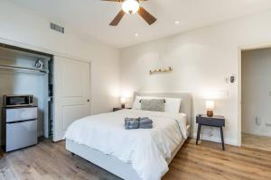 a bedroom with a bed and a ceiling fan at The San Diego Studio - Free Parking in San Diego