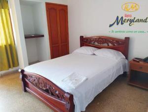 Postel nebo postele na pokoji v ubytování Hotel Meryland