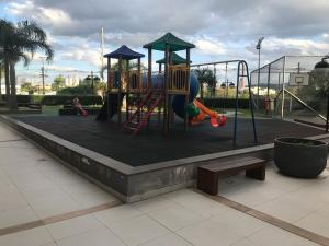 Children's play area sa Apartamento p/ 8 com garagem churasqueira e piscina