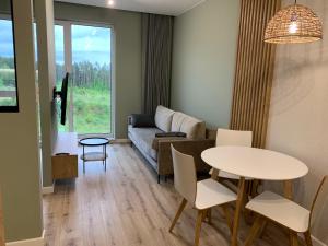 Posezení v ubytování Ukiel Park Green Apartament