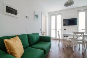Televízia a/alebo spoločenská miestnosť v ubytovaní The view apartment 2