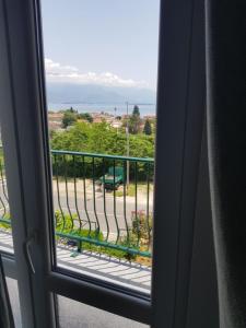 a view from a window of a balcony at Family apartment Krivokapic in Baošići