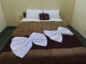 Cama o camas de una habitación en Recanto Varandas Guararema