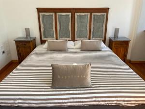 Postel nebo postele na pokoji v ubytování La Reggia di Famiglia