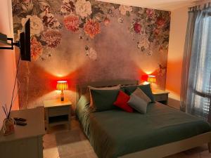 Łóżko lub łóżka w pokoju w obiekcie The Loft E&E Chianti Room