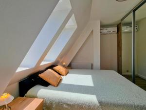 A bed or beds in a room at visit baltic - Apartament Teresa