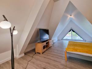 TV a/nebo společenská místnost v ubytování visit baltic - Apartament Teresa